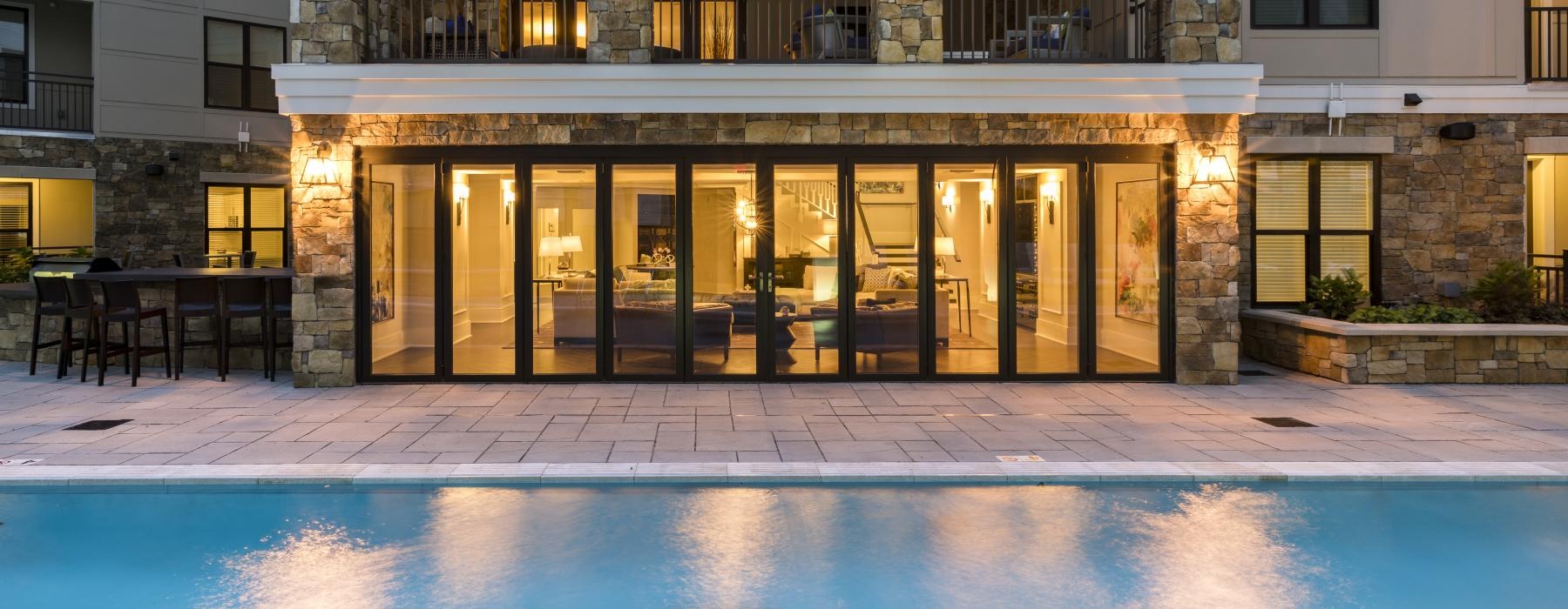 a pool in front of a building