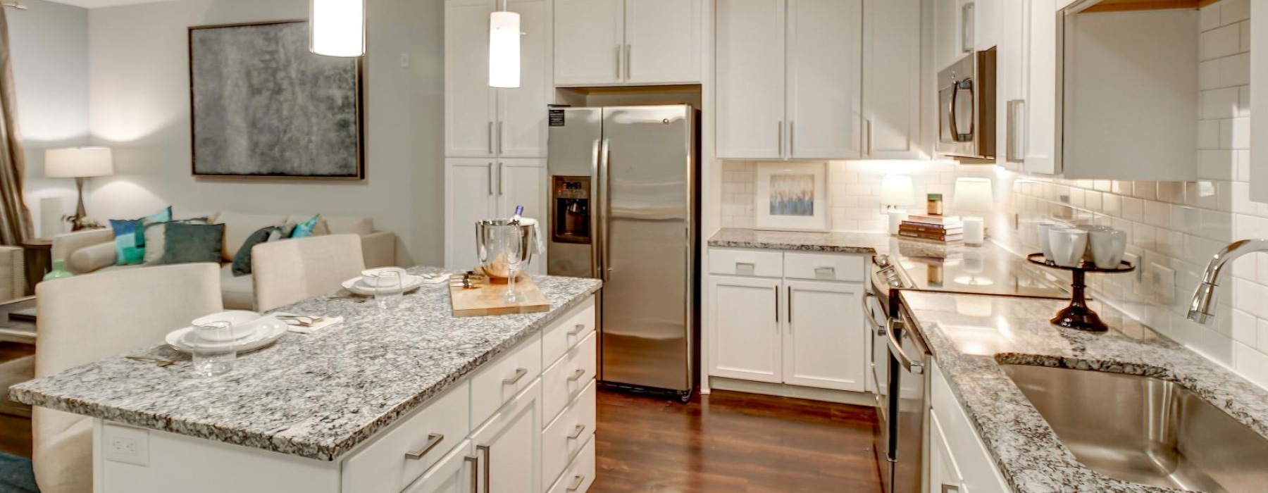 a kitchen with white cabinets